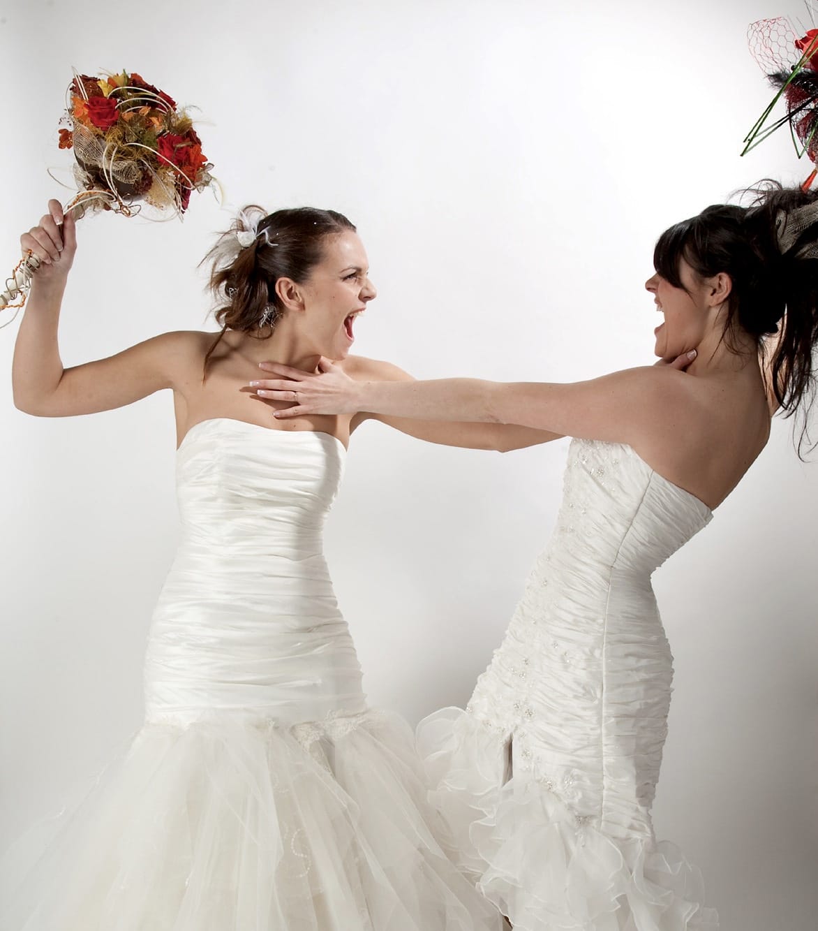 Girls in wedding dress fighting