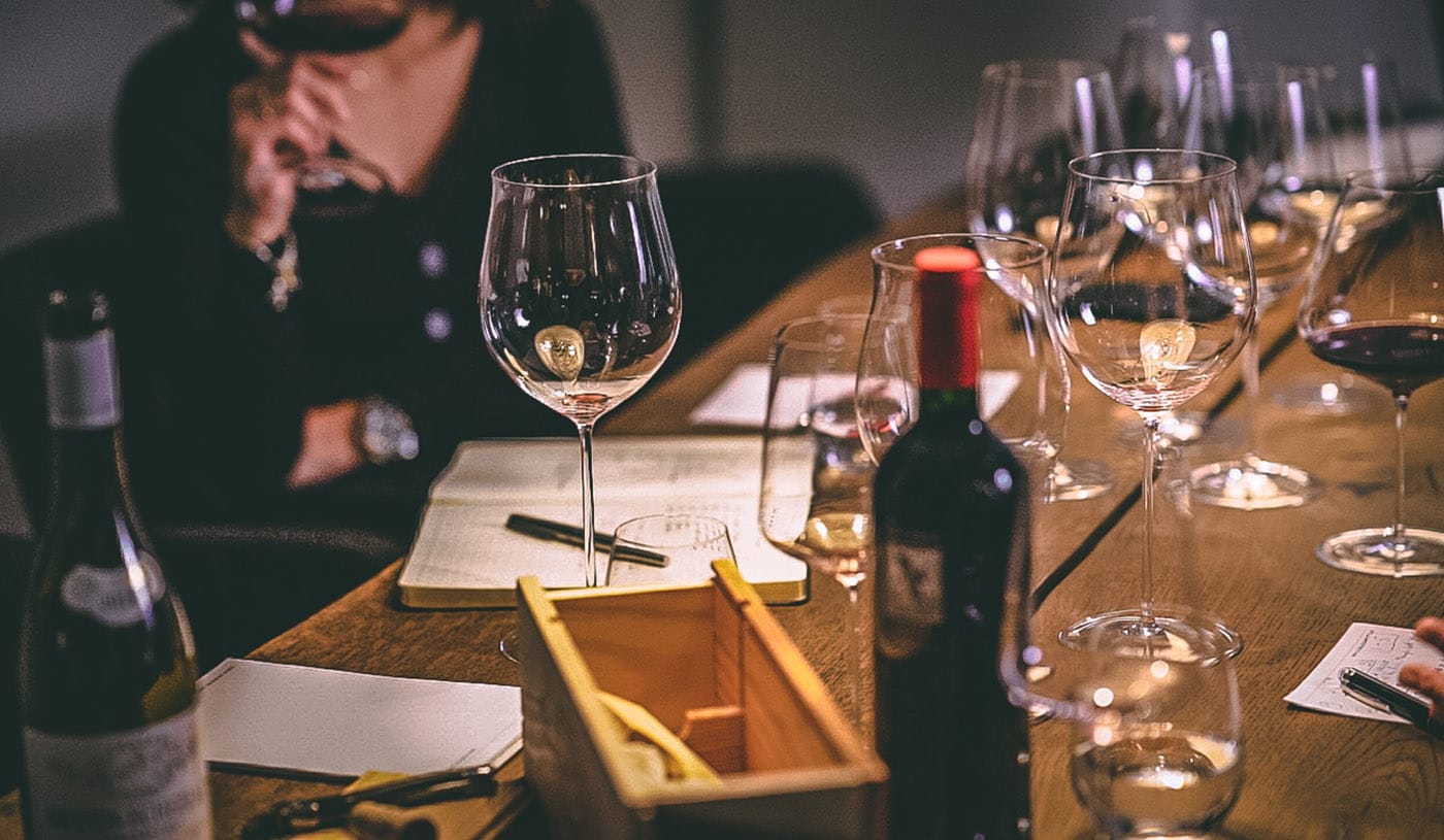 Table with wine glasses and bottles