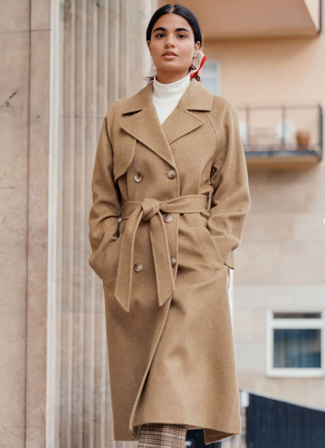 Woman in wool beige trench coat