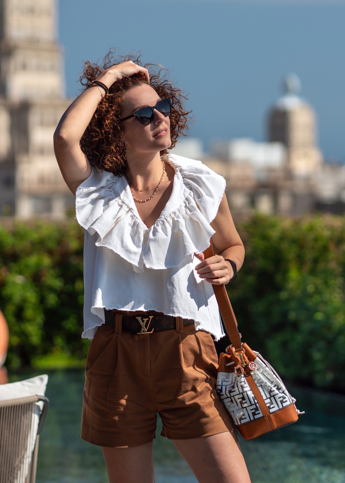 Girl in shorts and Fendi bag