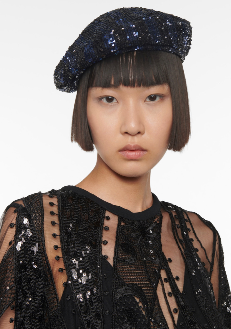 Asian girl with sequin beret