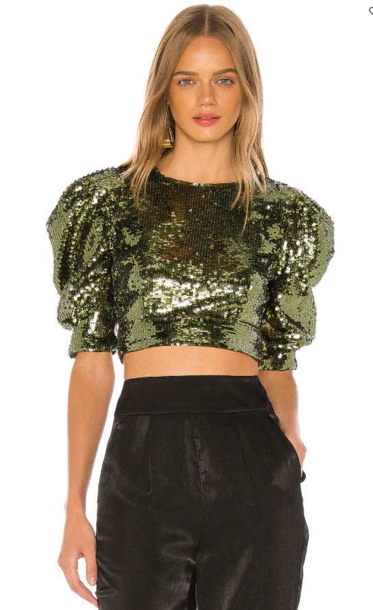 Girl in green sequined top