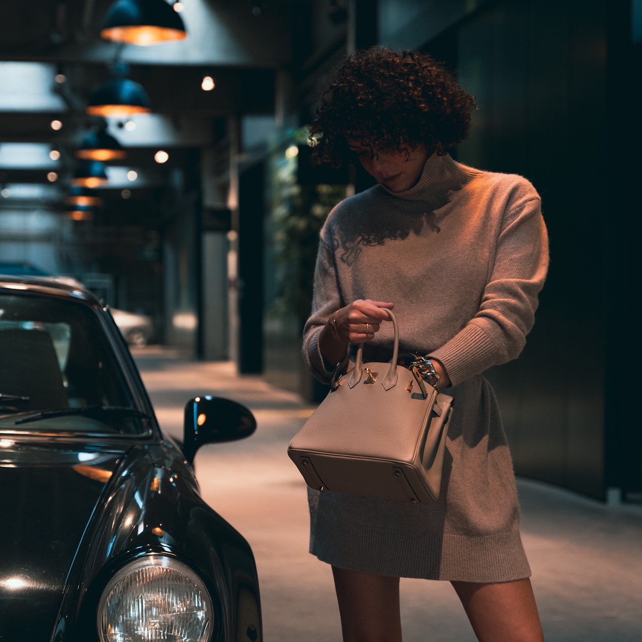 Girl with Hermes bag and Porsche